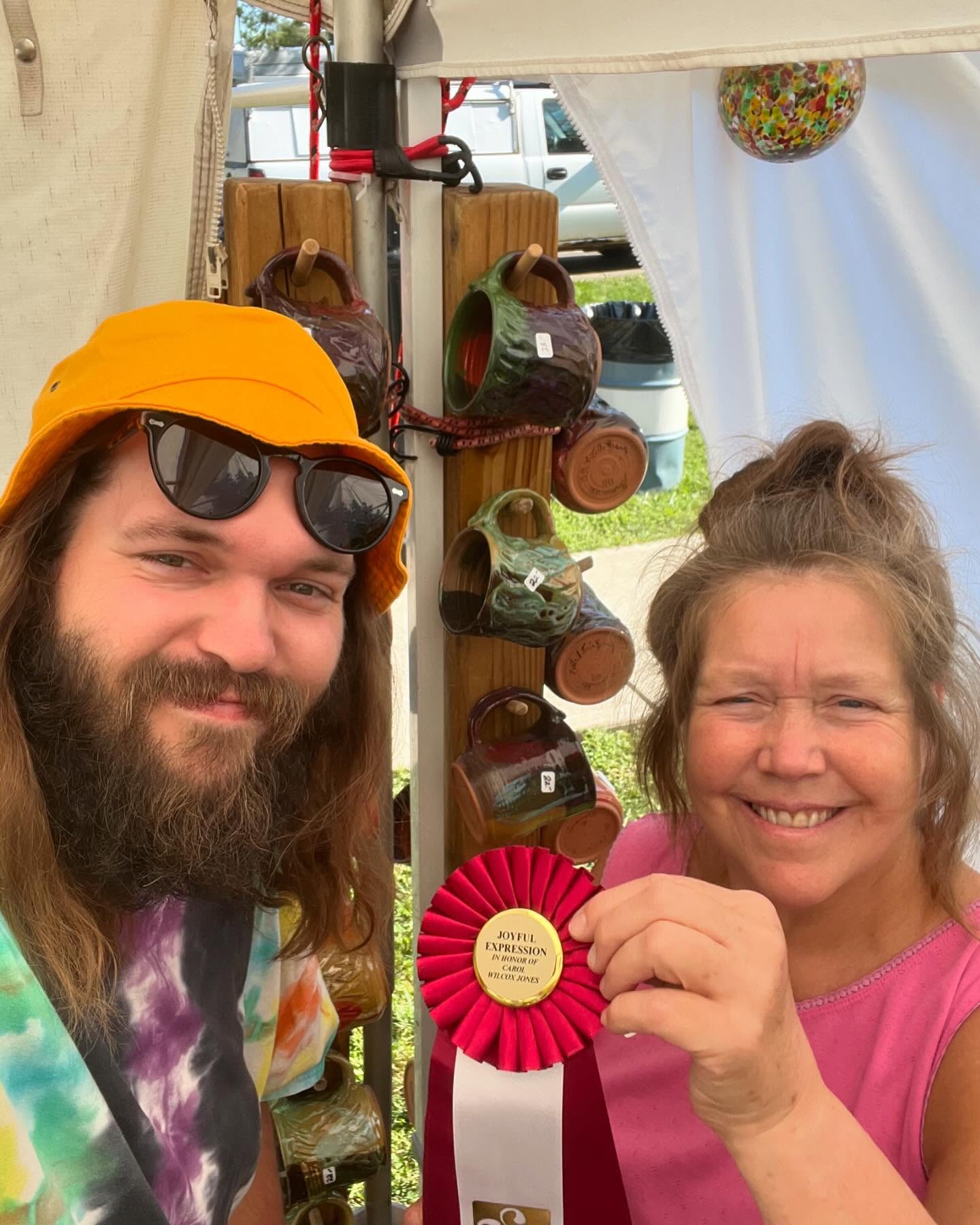 Cathy and son Jesse with award at show